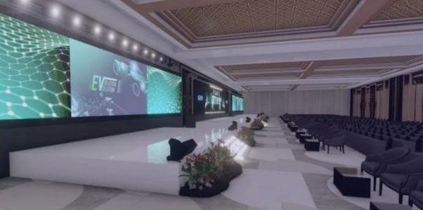 Ballroom set up with a wide LED stage and audience seating