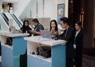 ARCA Management event staff working at registration counters